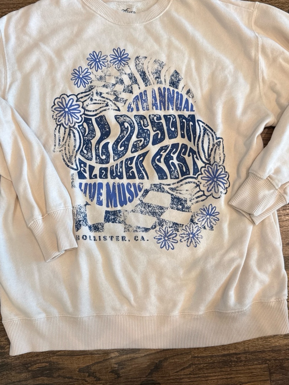 Hollister Cream Crewneck Sweatshirt with Blue Floral Graphic